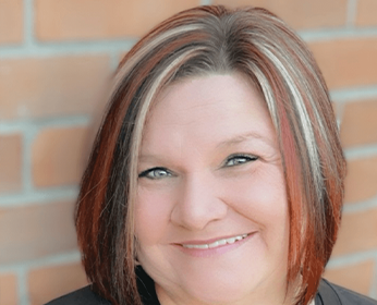 Lori, Treatment Coordinator helping patients at Erinwood Dental